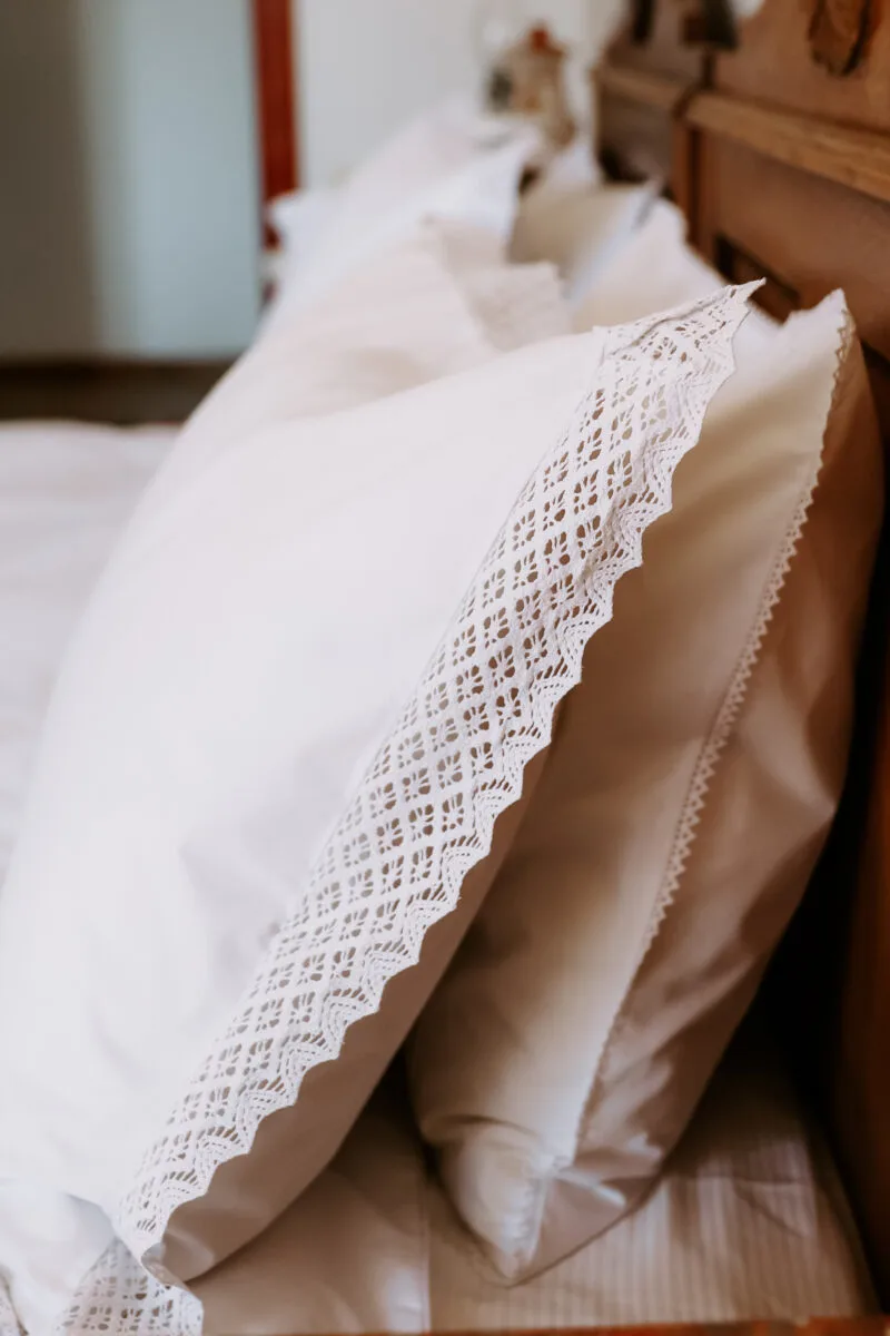 white bedding with luxury lace